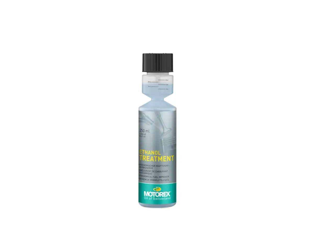 A bottle of MOTOREX Ethanol Treatment with a black cap and a silver label, shown against a plain white background.